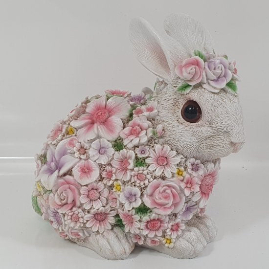 Dekorativ blomster kanin figur – sød og hyggelig have- og boligdekoration