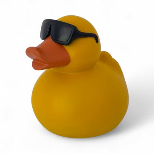 And figur med briller – sjov og dekorativ til hjem og have